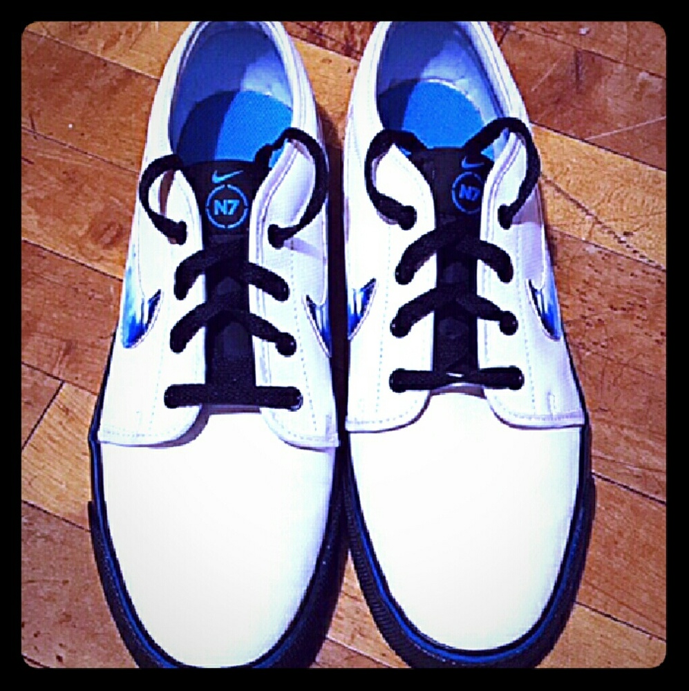 These are a all white and blue Nike Vans