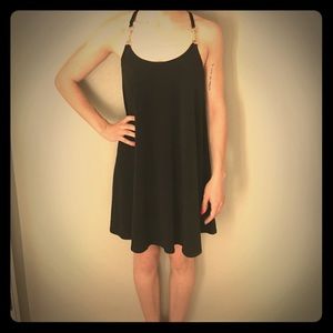 Black dress with gold hardware