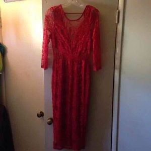 Beautiful red lace dress. Brand new without tags.