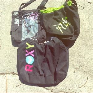 Bundle 2 Fox Racing bags and 1 Roxy