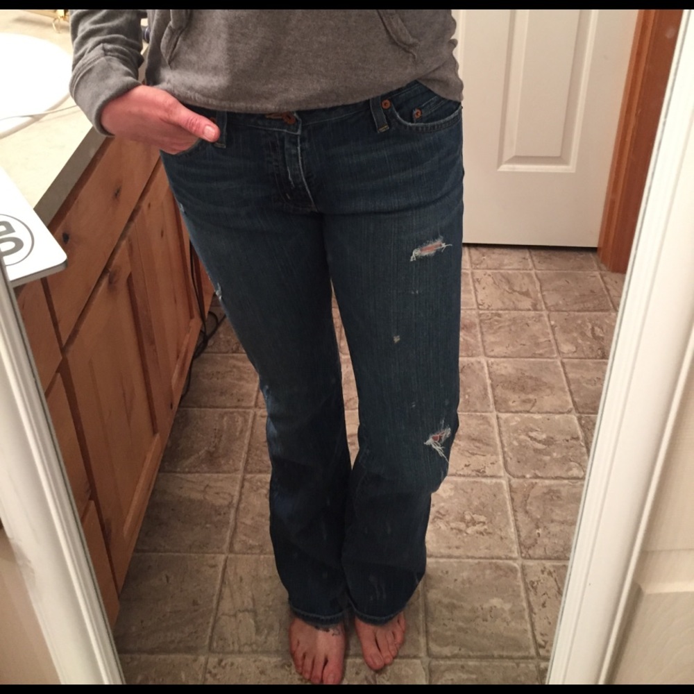 Distressed Big Star jeans.