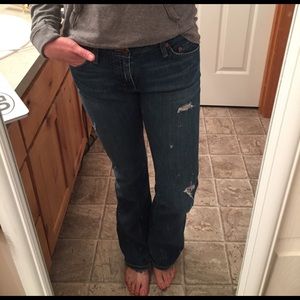 Distressed Big Star jeans.