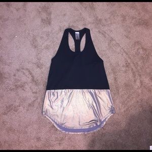 A rose gold and black workout tank from target