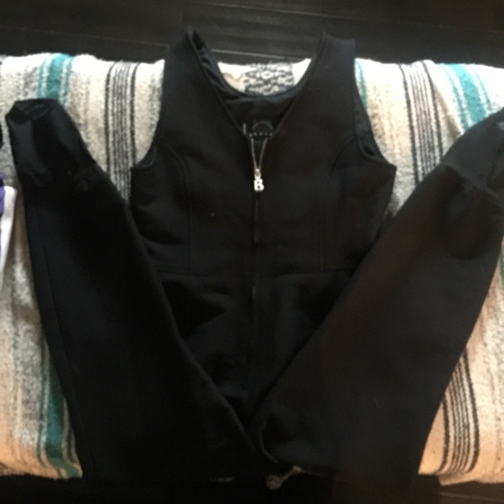 Ski one piece pants with stirrups.