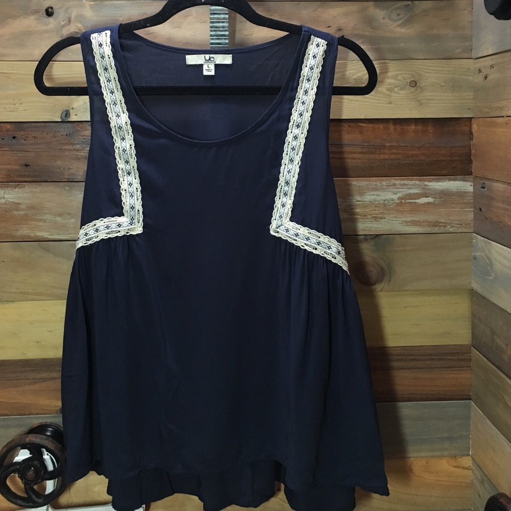 Sleeveless navy Blouse with white crochet trim