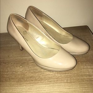 Nude pumps.