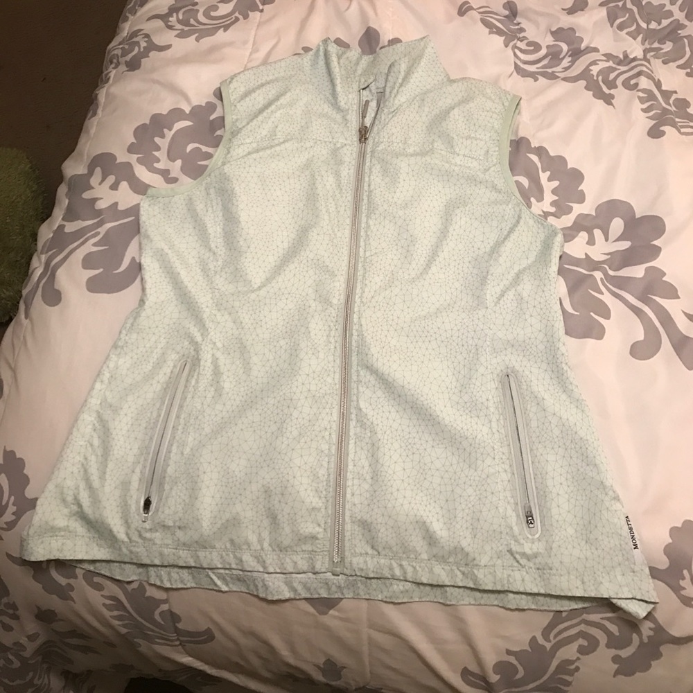 Teal patterned vest! Super cute!