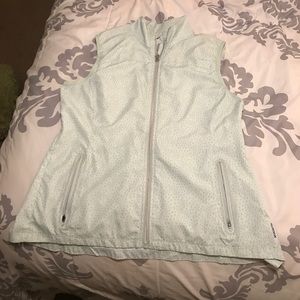 Teal patterned vest! Super cute!