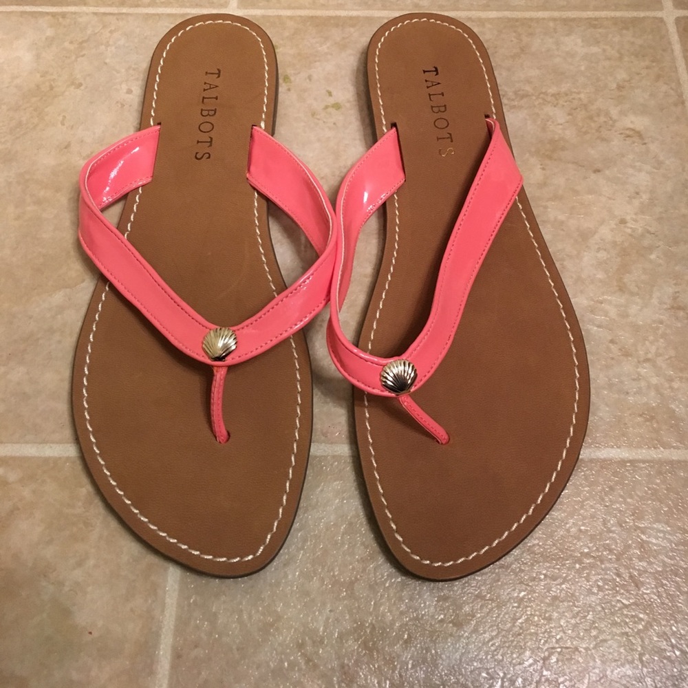 Never worn coral flip flops