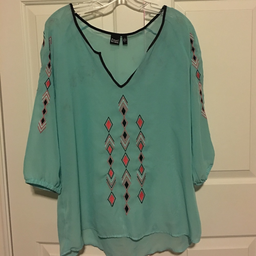 Sheer turquoise blouse
