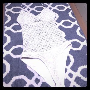 White one piece bathing suit with crochet pattern