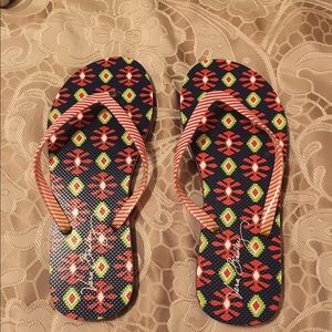 Vera Bradley pattern flip flops.