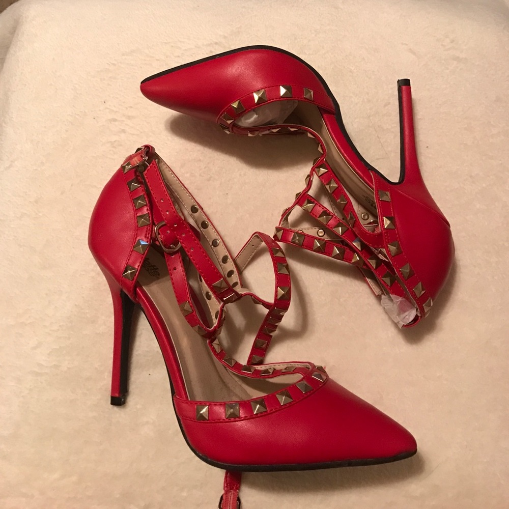 Red studded pointed T-strap heels!