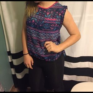 A cute blue top with an open back