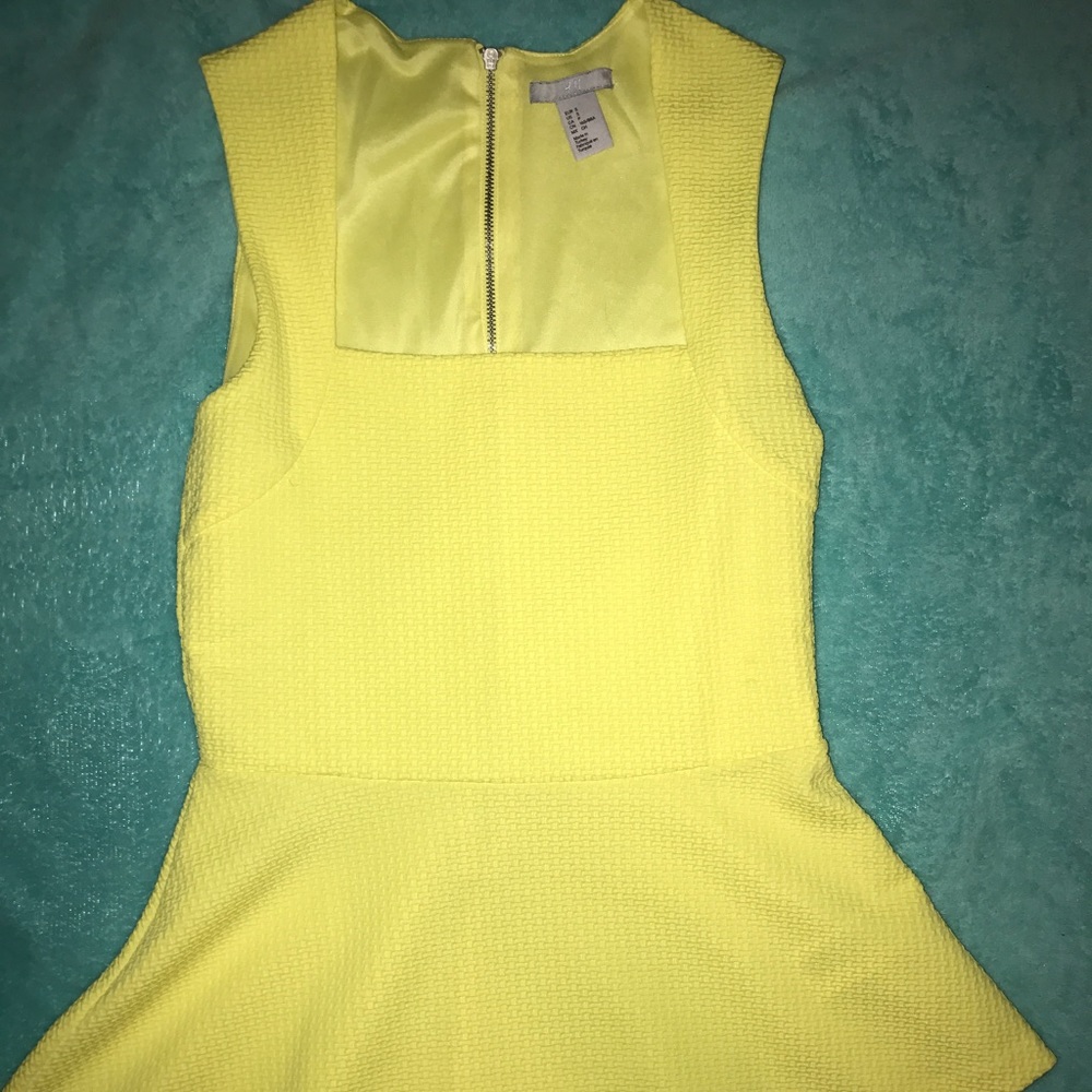 Yellow Sleeveless Peplum Top