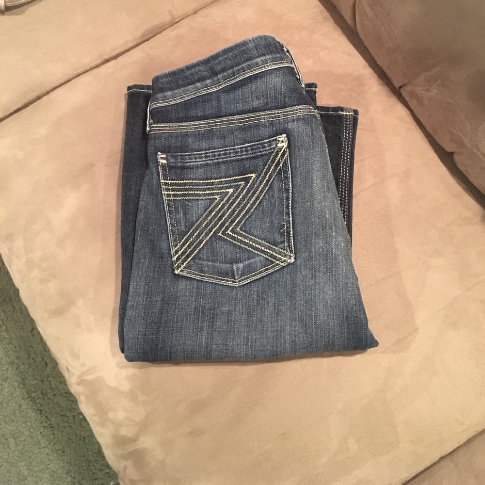 Woman's 7 for all mankind bootcut jeans.