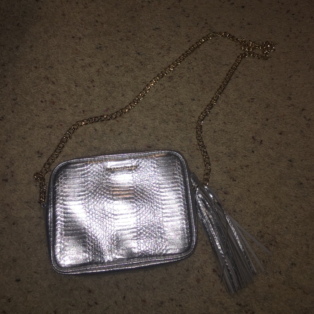 Victoria secret silver purse with a golden chain