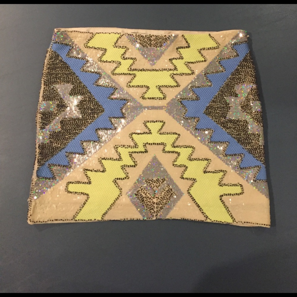 Never worn sequin mini skirt.