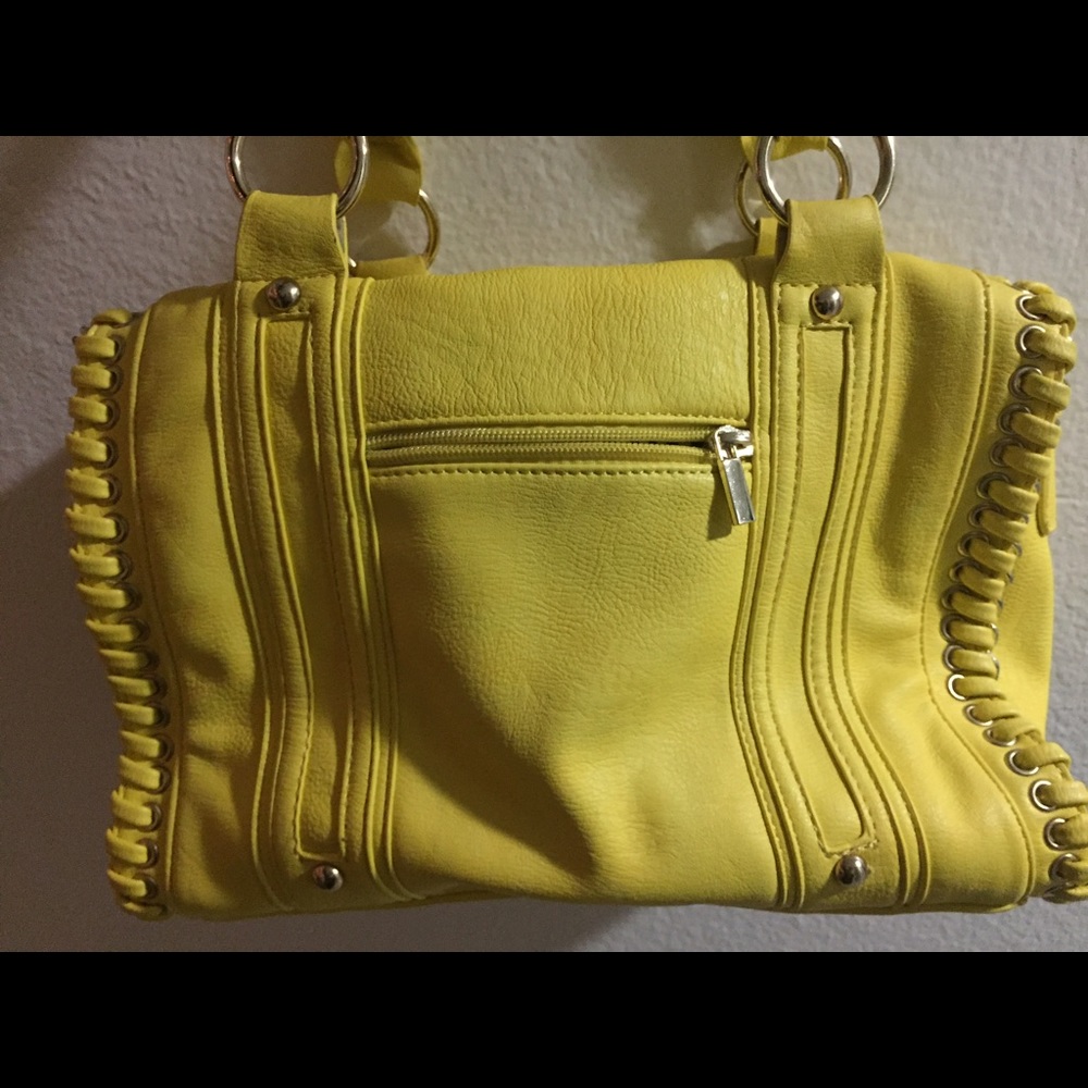 Bright yellow handbag from charming Charlie