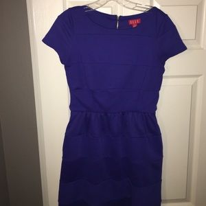 This dress has been worn once to a wedding!