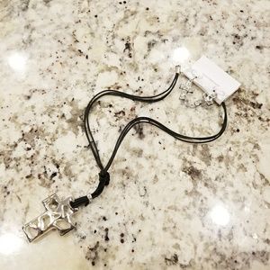 Silver cross necklace and earrings