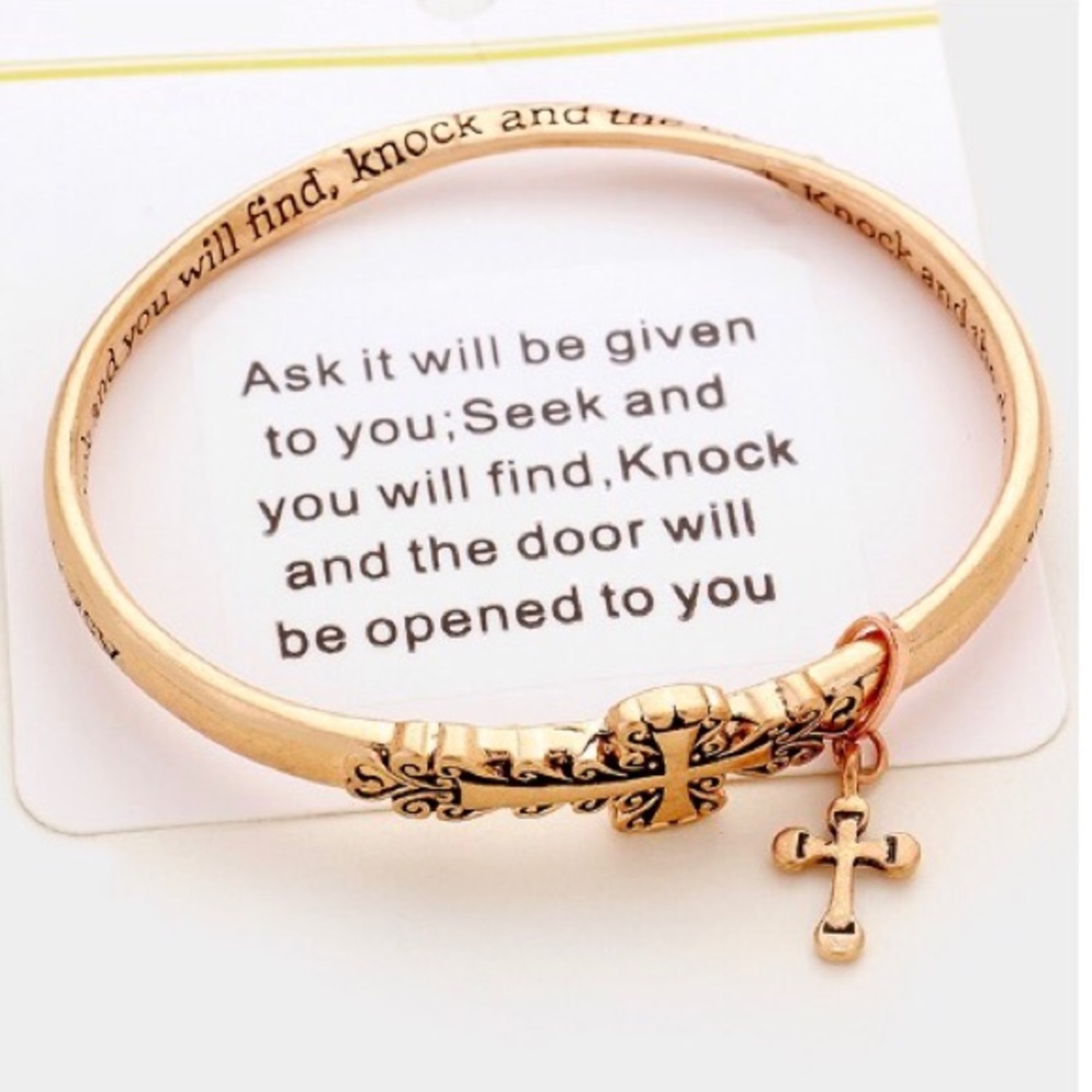 cross charm bracelet