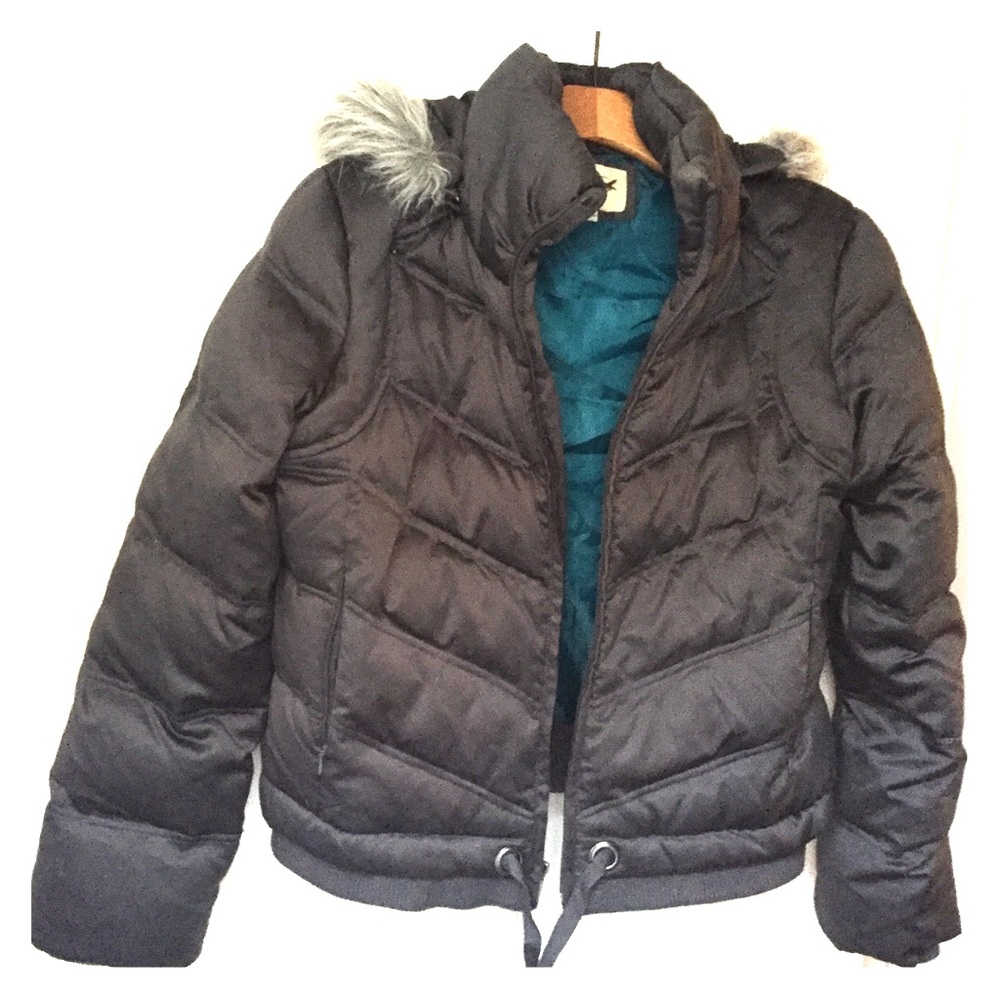 Warm puffy jacket with faux fur lined hood