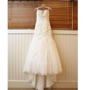 All lace, fitted bodice with asymmetrical ruching