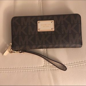 Michael Kors full zip monogram wallet