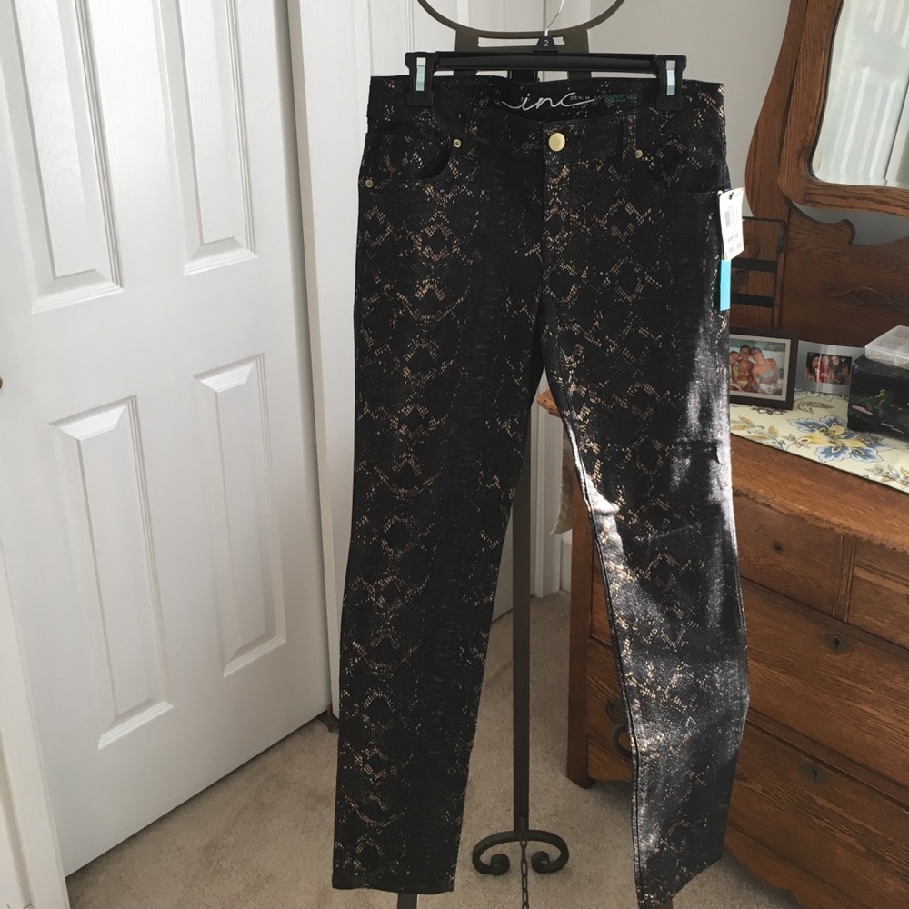 Snake skin denim pants in black and gold