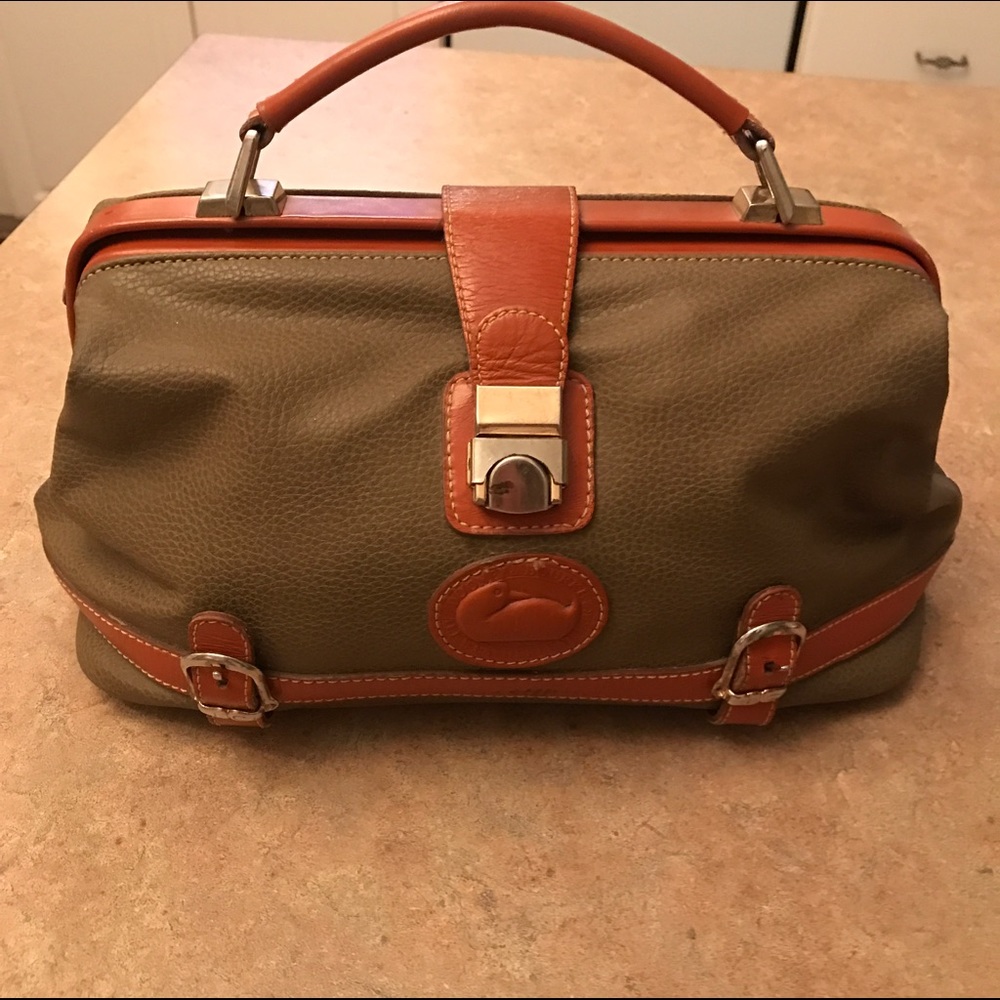 Authentic Dooney & Bourke clasp purse in Ivy