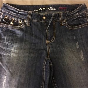 Woman's size 10 boot cut jeans.