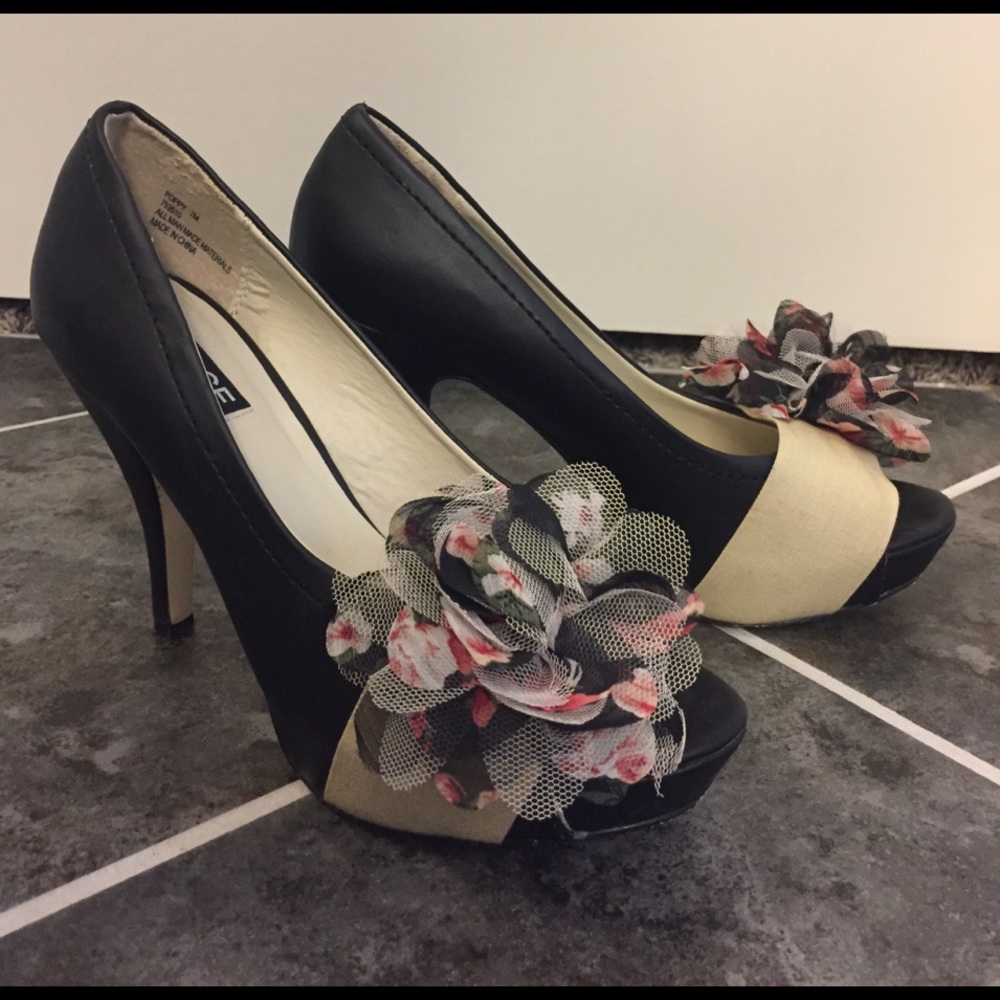 Black heels with flower detail