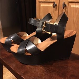 Black Michael Kors wedges. Size 7.5