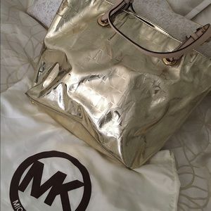 Authentic gold MK purse