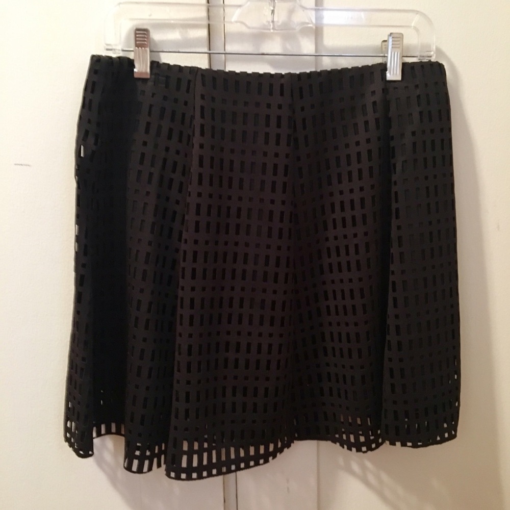Black mesh mini skirt