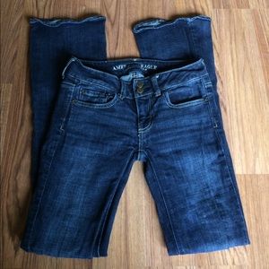 American Eagle Outfitters dark wash jeans.