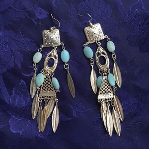 Statement feather earrings