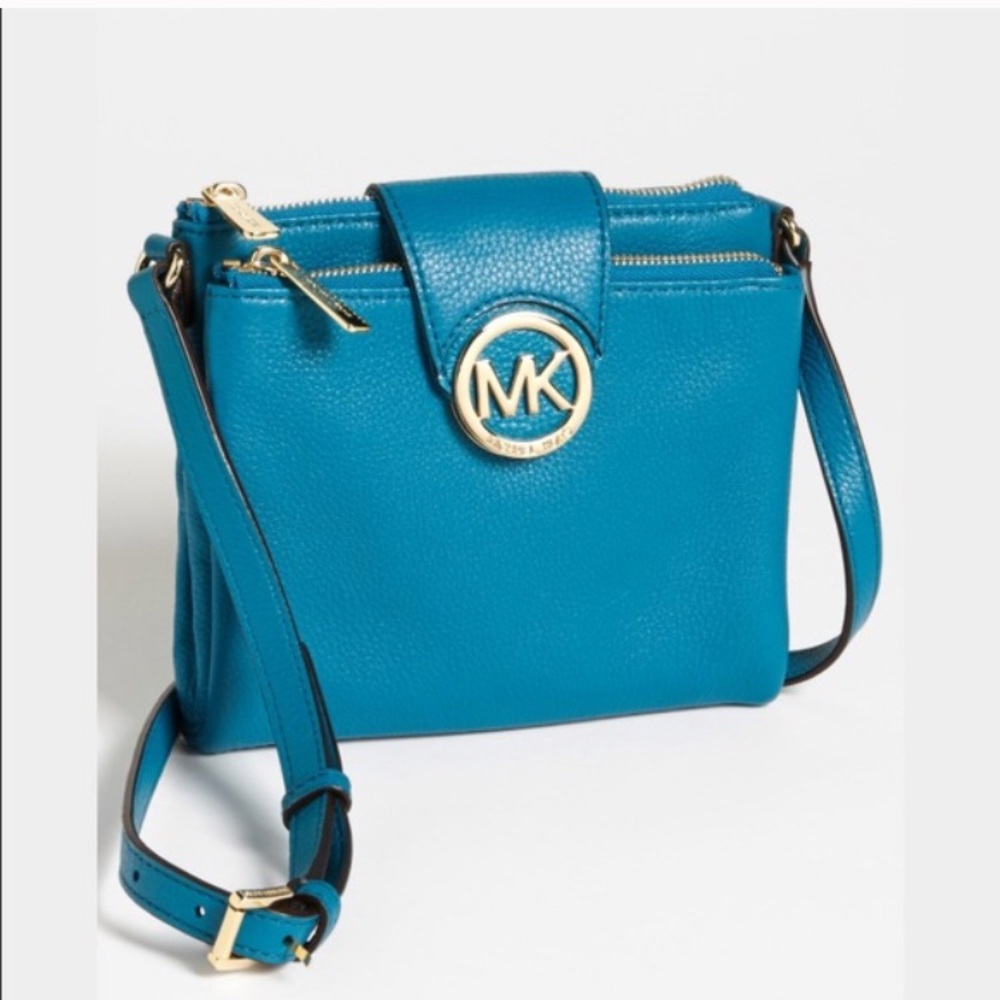 Beautiful turquoise MK cross body bag. never worn.