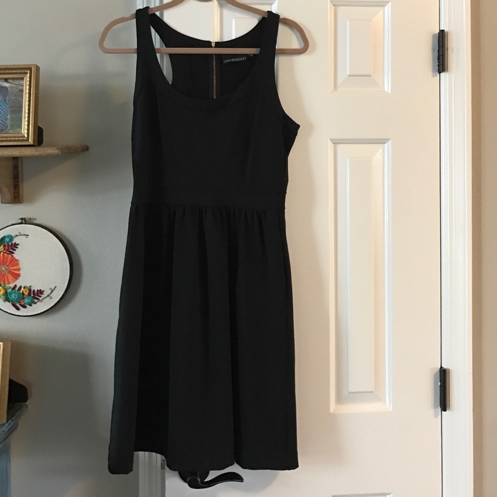The perfect little black go with anything dress.