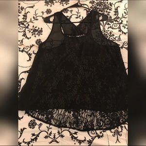 Sleeveless shirt with lace back
