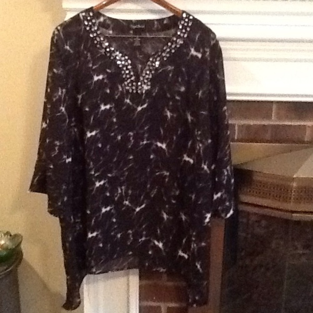 Maggie Barnes black and white shirt top