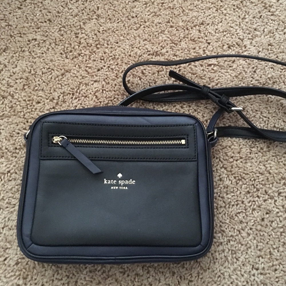Kate Spade crossbody bag. Navy blue leather.