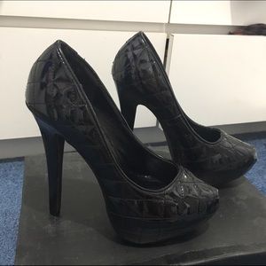 Black patent leather quilted platform stilettos