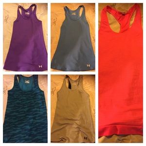 5 Under Armour fitted tanks 4 mediums and 1 small