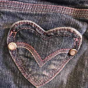 Boot cut Blue jeans with heart pockets