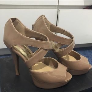 Nude strappy peep toe pumps