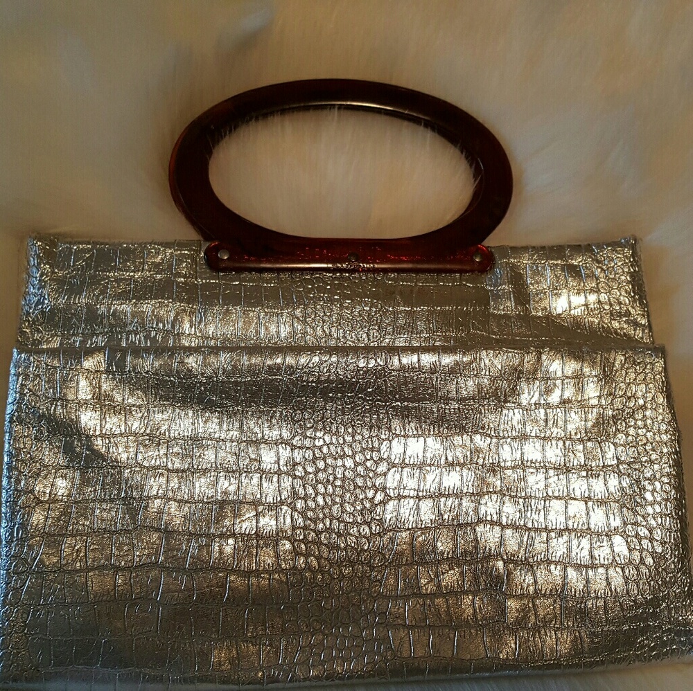 Vintage silver purse with Lucite handle.