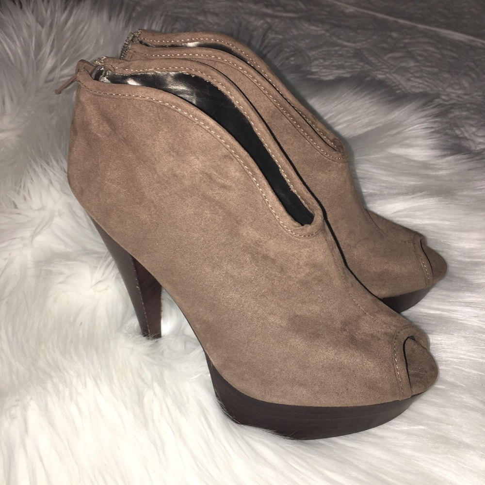 Carlos Santana Platform peep toe booties.