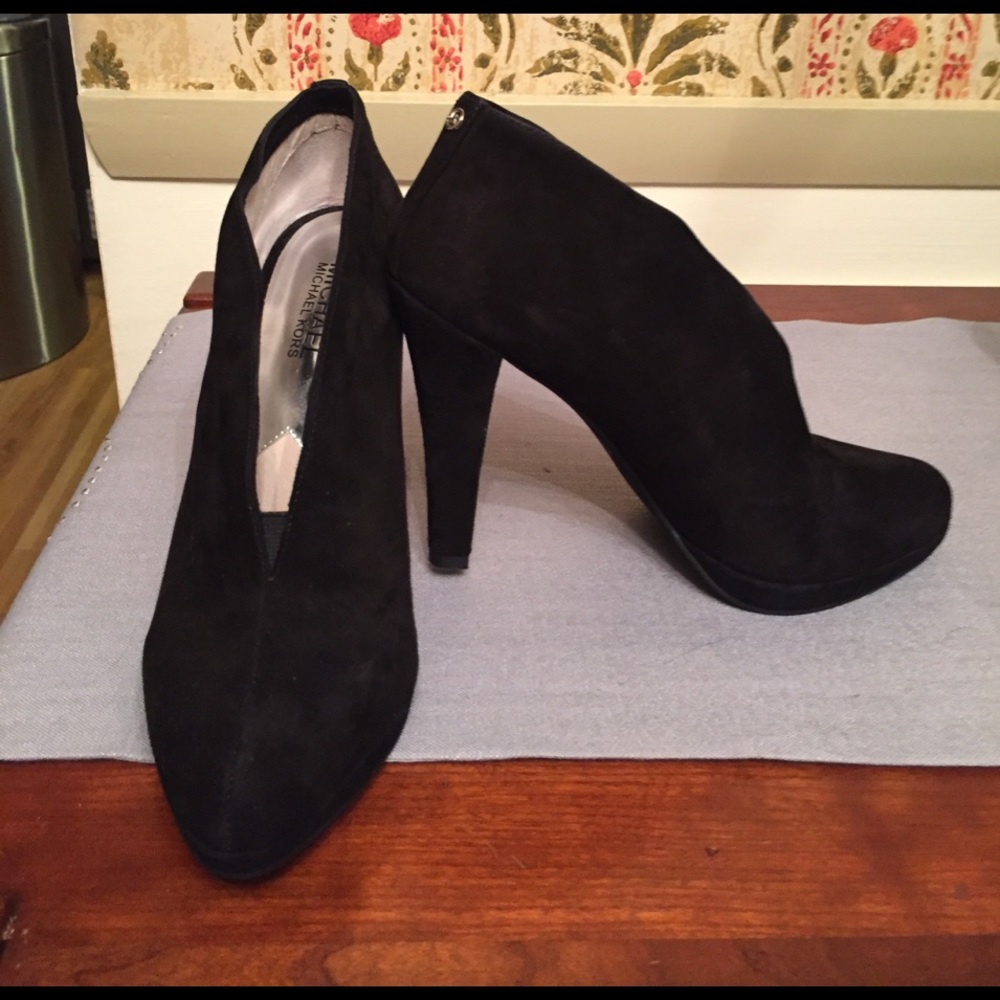 Black suede KORS Michael Kors booties with 4" heel